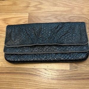 Laura Merkin metallic navy/silver sparkle zipper design clutch
